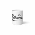 White mug with 'Botanicals' text and leaf design on a white background